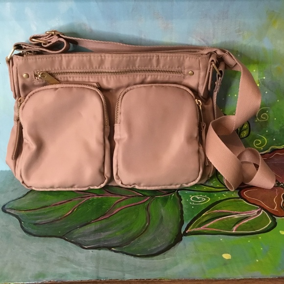 Handbags - Tan Colored Purse with Gold Zipper detail.